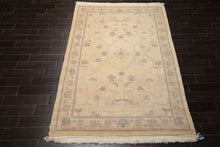 6x9 Ivory, Gray, Rose Color Hand Knotted Tibetan Wool Transitional Oriental Rug