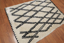 4'3" x 6' Handmade Geometric Pattern Moroccan Shag Area Rug Beige