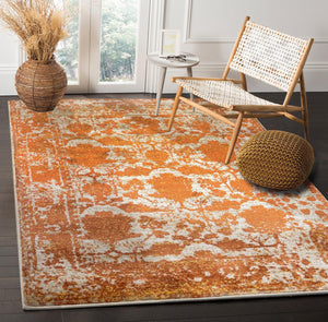 Ivory Beige Orange Color Machine Made Persian style rugs in living room area.