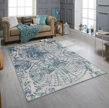 Gray Blue Color Machine Made Persian style rugs in living room.